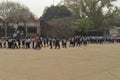 A bunch of children going to visit national zoological park standing in queue outside of Delhi Zoo