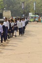 A bunch of children going to visit national zoological park standing in queue outside of Delhi Zoo