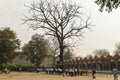A bunch of children going to visit national zoological park standing in queue outside of Delhi Zoo
