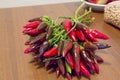 Bunch of chillies on wooden kitchen table