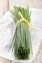 Bunch chives on white kitchen paper Royalty Free Stock Photo