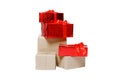 Bunch of Christmas gifts on an isolated white background. A mountain of Christmas boxes. Red and paper gifts.