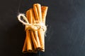 Bunch of cinnamon sticks on black background Royalty Free Stock Photo