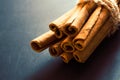Bunch of cinnamon sticks on black background Royalty Free Stock Photo