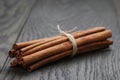 Bunch of cinnamon sticks tied with twine Royalty Free Stock Photo