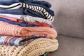 Bunch of different colorful clothing items folded in stack Royalty Free Stock Photo