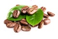 a bunch of coffee beans with green leaves on a white background, Royalty Free Stock Photo