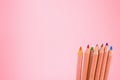 Bunch of color pencils on pink Royalty Free Stock Photo