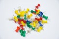 Bunch of colored thumbtack push pins isolated on white Royalty Free Stock Photo