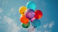 A Bunch of Colorful Balloons Floating in the Air Royalty Free Stock Photo