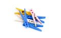 A bunch of colorful clothespins on isolated white background Royalty Free Stock Photo