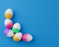 Bunch of colorful eggs on a blue Easter background 3D Rendering. Pile of birght and colorful Easter Eggs - 3d render. Easter