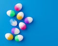 Bunch of colorful eggs on a blue Easter background 3D Rendering. Pile of birght and colorful Easter Eggs - 3d render. Easter
