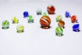 Bunch of colorful glass marbles on the white background Royalty Free Stock Photo