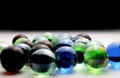 Colourful glass marbles in a close up shot. Bunch of colorful glass marbles. Royalty Free Stock Photo