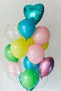 Bunch of colorful helium balloons for birthday