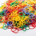 Bunch of colorful multi color small rubber bands elastic bands on a white background Royalty Free Stock Photo