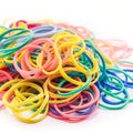 Bunch of colorful multi color small rubber bands elastic bands on a white background Royalty Free Stock Photo