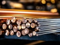 A bunch of copper rods sitting on top of a table Royalty Free Stock Photo