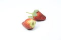 a bunch of creatively arranged strawberries with a white background. selective focus