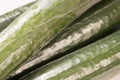 Bunch of cucumber wrapped in plastic films Royalty Free Stock Photo
