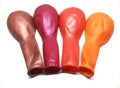 Bunch of Deflated or Flat Metallic Balloons on White Background Royalty Free Stock Photo