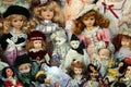 Bunch of different old dolls on market of old things, garage sale