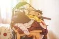 Bunch of dirty clothes pile heap on wooden surface, messy concept f