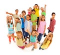 Bunch of diverse kids standing pointing at camera