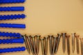 A bunch of dowel nails and plastic plugs for them. Royalty Free Stock Photo