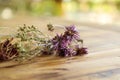 Bunch of dried daisies and other flowers on wooden table top with copy space Royalty Free Stock Photo