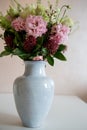 Bunch of elegant flowers in vase as love or Valentines day attribute