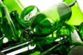 A bunch of empty green glass bottles collected for recycling sale. Waste management concept Royalty Free Stock Photo