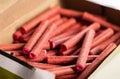 A bunch of firecrackers with red sulfur. Set of pyrotechnics, explosion hazard, macro. Royalty Free Stock Photo