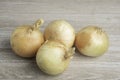 Sweet White Onions On A Painted Panel Board Royalty Free Stock Photo