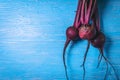 A bunch of fresh beets on old blue wooden table. Copy space. Healthy food. Raw Vegetables Royalty Free Stock Photo