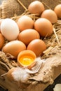 Bunch of fresh brown eggs in a wooden crate. Royalty Free Stock Photo