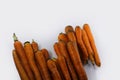 a bunch of fresh carrots isolated on white background freshly harvested from the garden Royalty Free Stock Photo