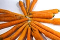 a bunch of fresh carrots isolated on white background freshly harvested from the garden Royalty Free Stock Photo