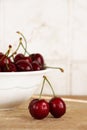 A bunch of fresh cherries in a bowl Royalty Free Stock Photo