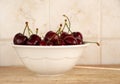 A bunch of fresh cherries in a bowl Royalty Free Stock Photo