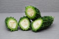 Bunch of Fresh cut bitter melon on agray background Royalty Free Stock Photo