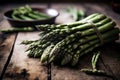 Bunch of fresh green asparagus lies on an old wooden table. Generated by AI Royalty Free Stock Photo