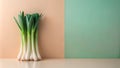 A bunch of fresh leeks rests on a minimalist surface against a peach and mint green backdrop. Generative AI Royalty Free Stock Photo