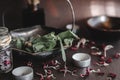 Bunch of fresh mint in a metal rustic vintage old bowl on a wiccan witch altar