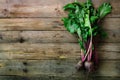 Bunch of fresh organic beetroot on wooden background. Concept of diet, raw, vegetarian meal. Farm, rustic and country Royalty Free Stock Photo