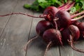 Bunch of fresh organic beets on rustic wooden table