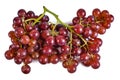 Fresh raw crimson seedless pink grapes on white background