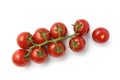 Bunch of fresh, red tomatoes with green stems isolated on white background. Royalty Free Stock Photo