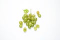 Bunch of fresh ripe green grapes with leaf on white background, top view Royalty Free Stock Photo